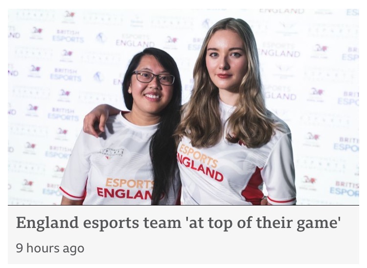 two women dressed in England esports t-shirts